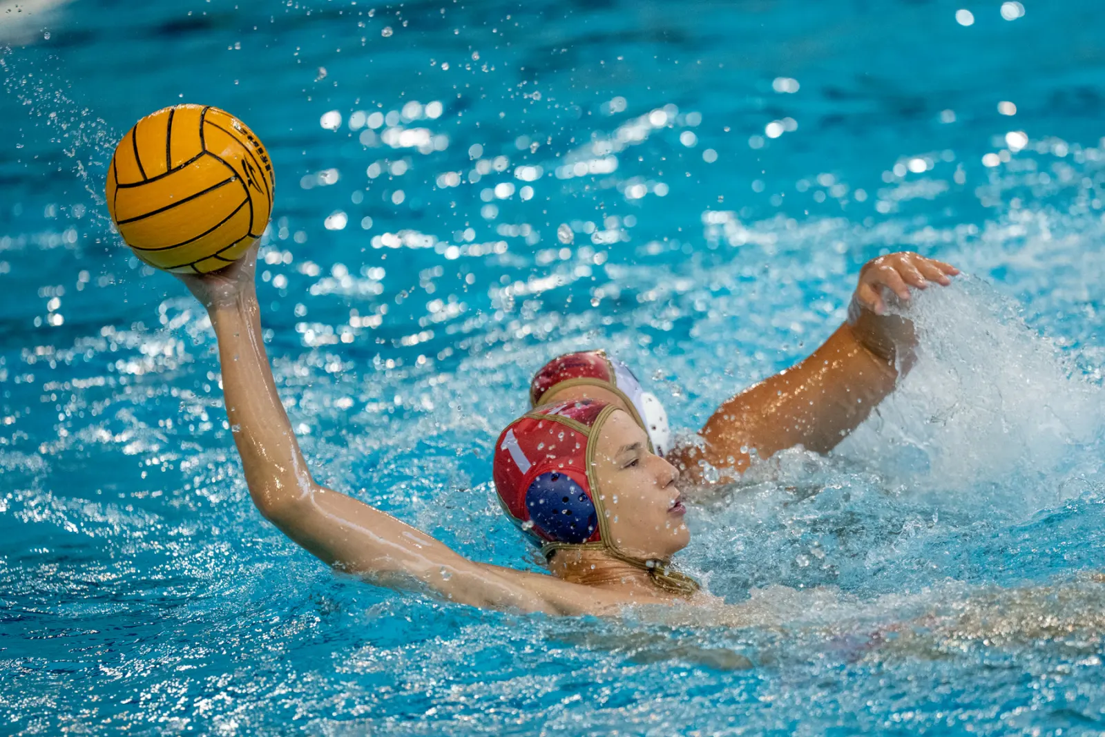 Young player winding up a shot
