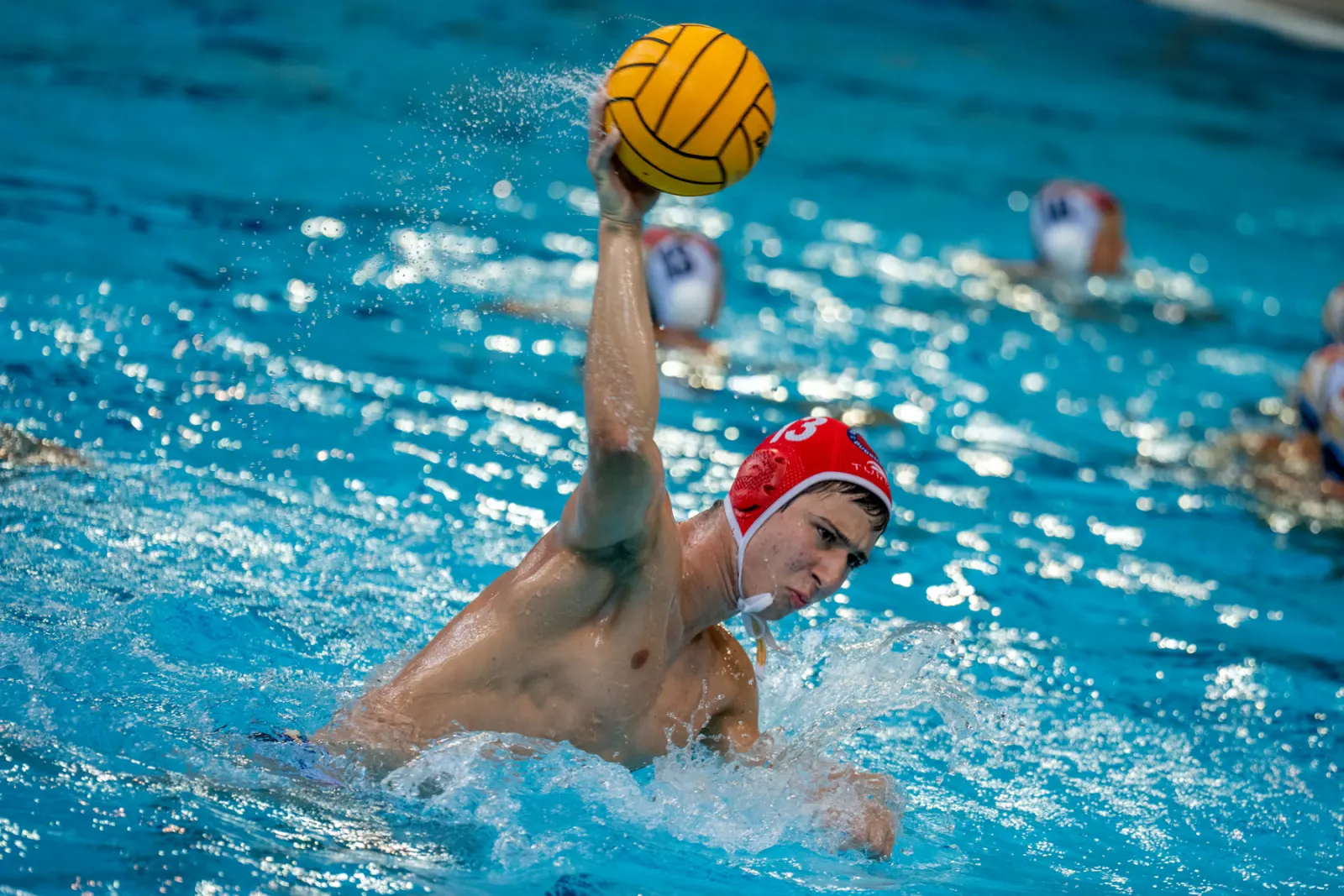 Player shooting with a red cap
